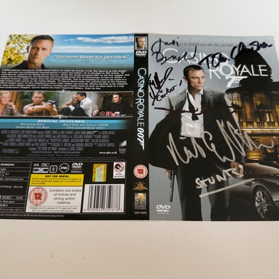 SIGNED JAMES BOND "CASINO ROYALE" DVD SLEEVE FROM JUDI DENCH, DAVID ARNOLD, RICK ENGLISH, JOSEPH MILLSON AND TOM CHADBON.